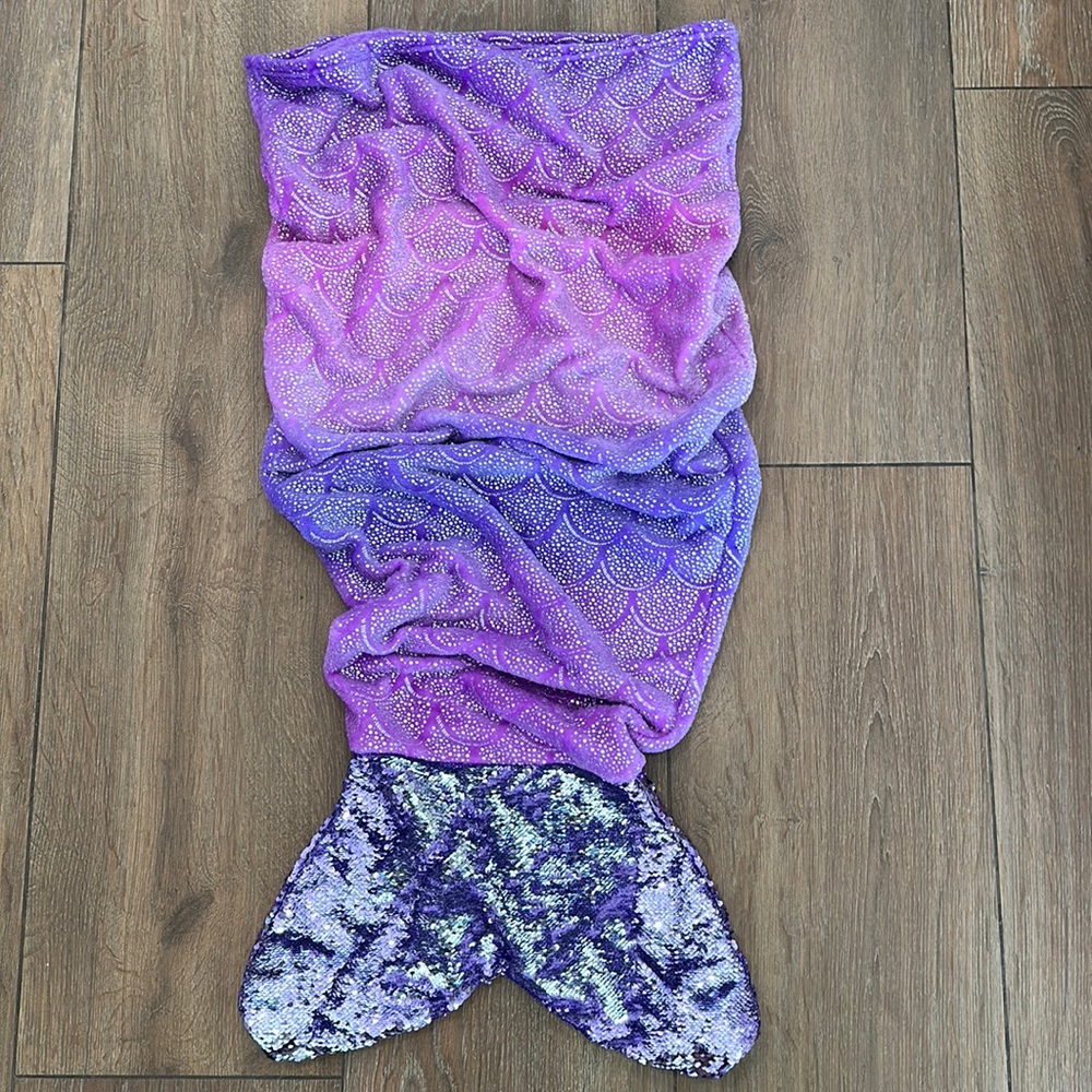 Mermaid snuggle. Color shades of pink, purple. Very soft with sequins tail.